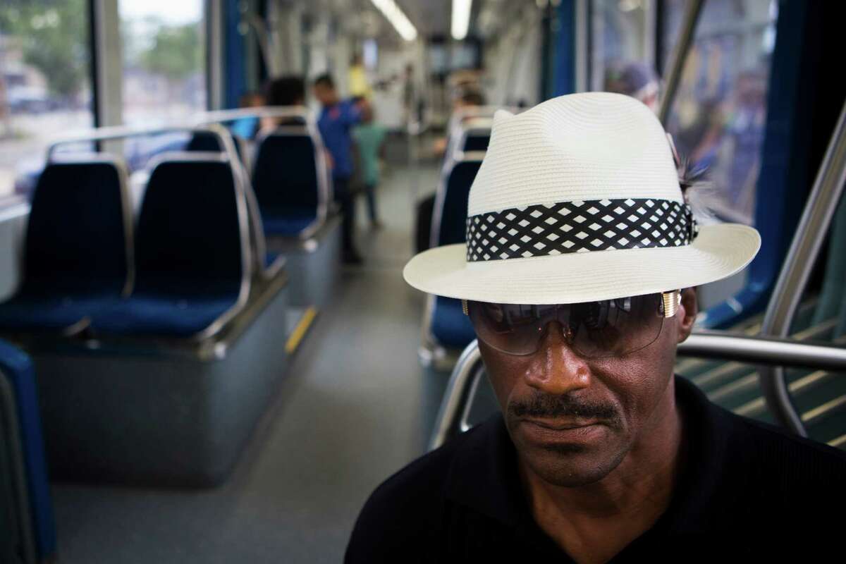 Randy Hayes a frequent Metro user, rides the Green Line on its opening day, May 23, 2015.