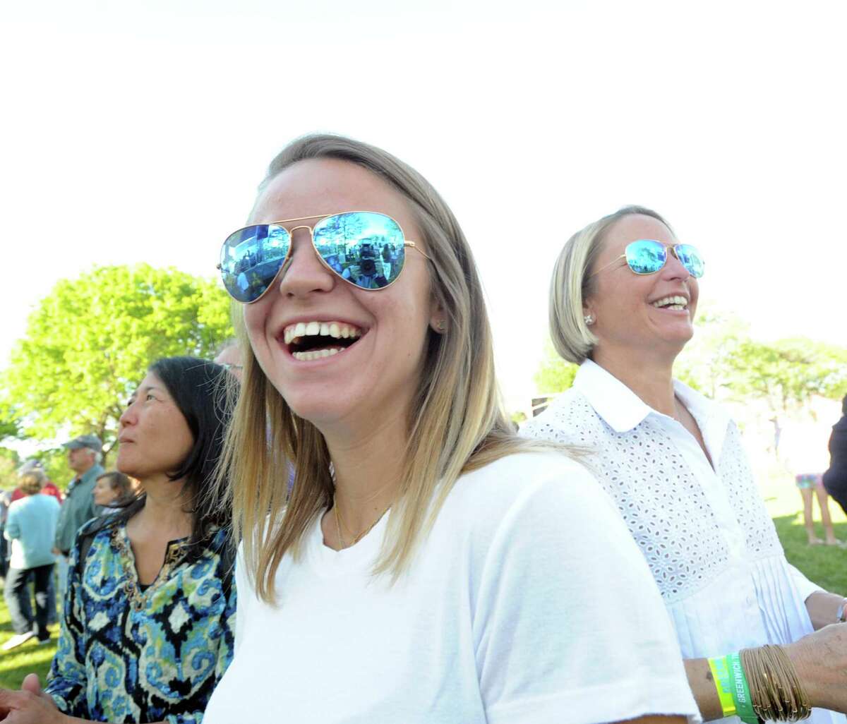 Nicole Mandala of Greenwich, center, and her mother, Sheryl Mandala, right, attended the Greenwich Town Party at Roger Sherman Baldwin Park, Greenwich, Conn., Saturday, May 23, 2015.