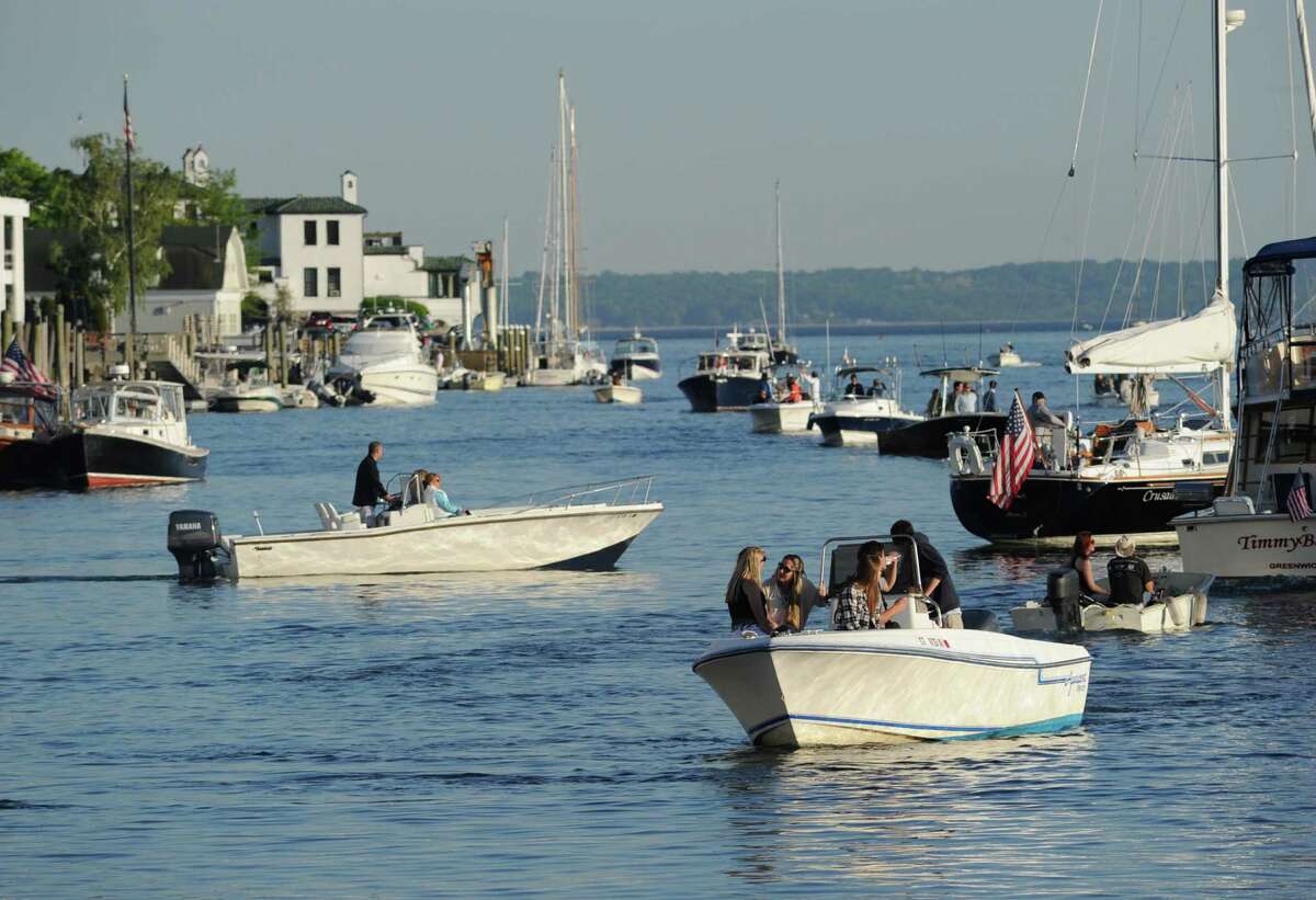 It was a crowded Greenwich Harbor as boats looked fro good positioning to listen to the music acts at the Greenwich Town Party in Roger Sherman Baldwin Park, Greenwich, Conn., Saturday, May 23, 2015.
