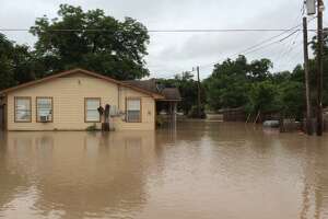 8 people missing as house swept away by raging Texas river