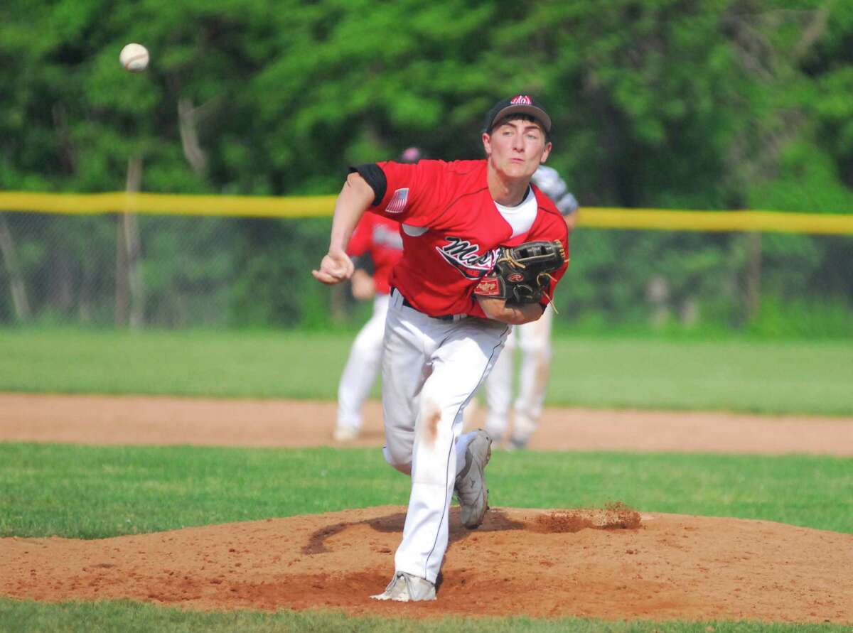 Warde pitcher John Natoli throws a pitch during a game against Staples on Tuesday.