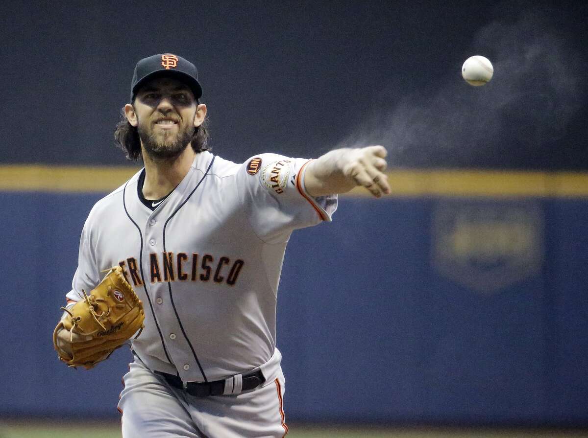 Madison Bumgarner fires complete game against Brewers