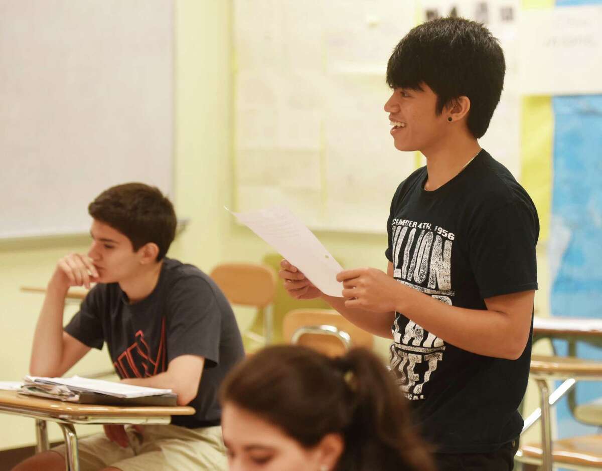 GHS junior Joash Bag-Ao participates in a class discussion during an English as a Second Language class at Greenwich High School in Greenwich, Conn. Wednesday, May 27, 2015.