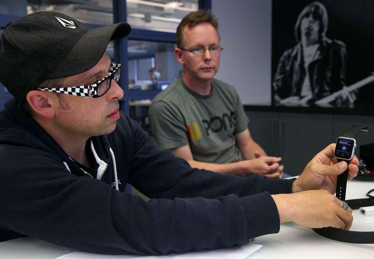 Pandora's lead product designer Jason Tusman and director of device engineering Carl Edwards demo the streaming music service on new platforms, including the Apple Watch, in Oakland, Calif. on Wednesday, May 27, 2015.