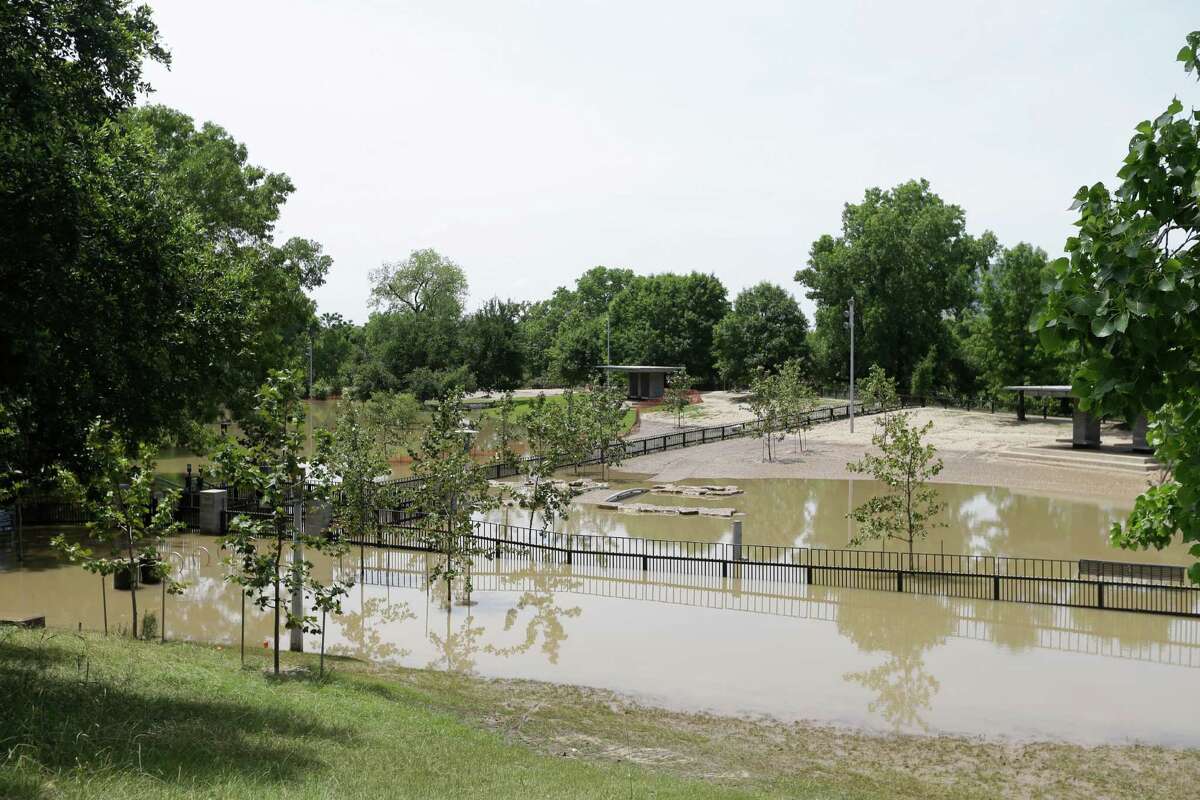 Flood water is shown covering much of the Johnny Steele Dog Park in Buffalo Bayou Park Wednesday, May 27, 2015, in Houston.