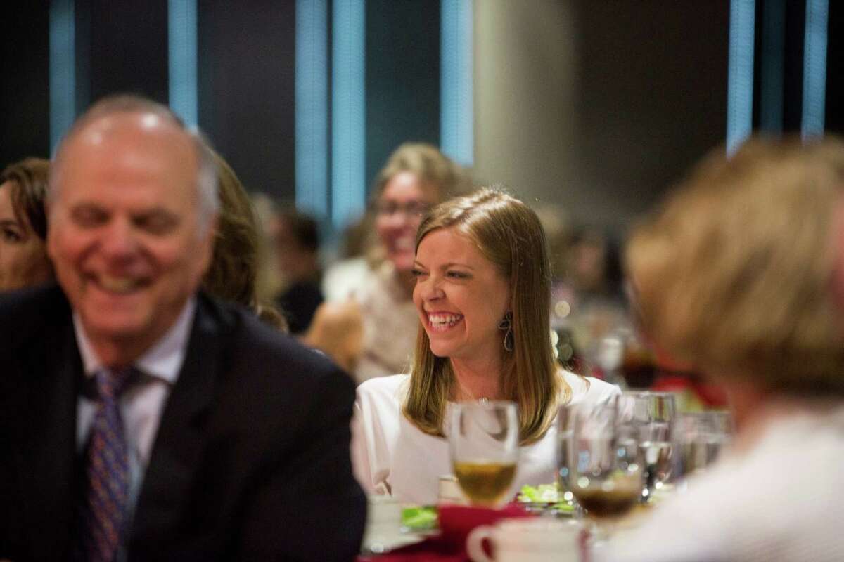 Kelly Wade Fry laughs as Jenna Bush Hager tells a story to 500 Women's Leadership Council members during the United Way Power of the Purse Luncheon at Valero in San Antonio, Texas on Thursday, May 28, 2015. She and Hager went to college together.