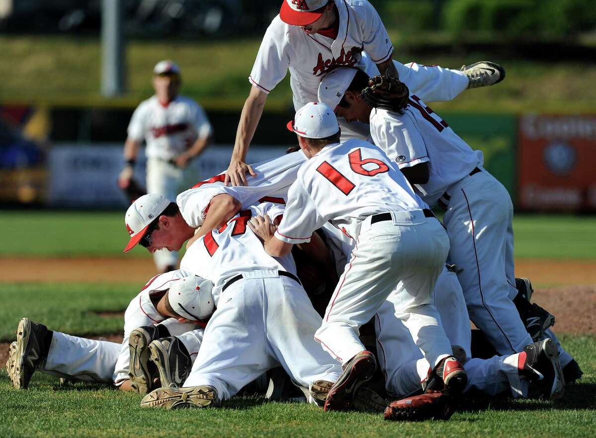 Albany Academy celebrates their 7-0 win over Schuylerville in the Class B baseball final on Thursday, May 28, 2015, at Joe Bruno Stadium in Troy, N.Y. (Cindy Schultz / Times Union)