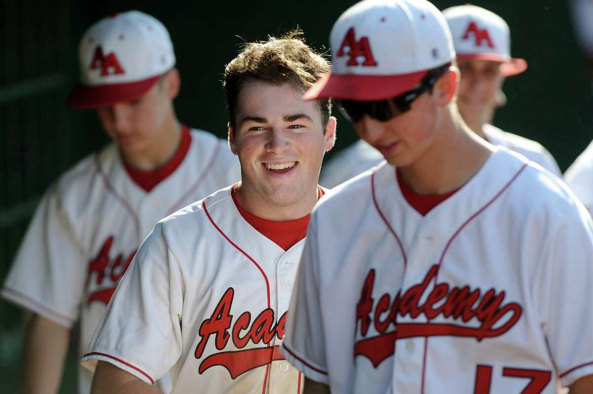 Albany Academy's Kyle Hartigan, center, celebrates his run during their Class B baseball final against Schuylerville on Thursday, May 28, 2015, at Joe Bruno Stadium in Troy, N.Y. (Cindy Schultz / Times Union)