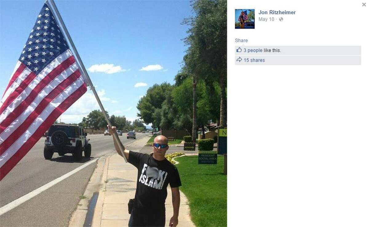 Jon Ritzheimer, shown on his Facebook page wearing a t-shirt with the phrase "[expletive] Islam" while carrying an American flag, will a controversial contest Friday to draw the Islamic prophet Muhammad in front of an Arizona mosque attended by two attempted shooters who tried to attack a similar contest in Garland on May 3, 2015.