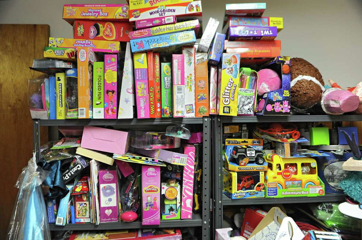 Some of the donated party supplies Fazana Saleem-Ismail uses for birthday parties for homeless children on Wednesday, May 27, 2015 in Schenectady, N.Y. Fazana founded the nonprofit organization Jazzy Sun Birthdays in order to give kids who are living in shelters a sense of normalcy with real birthday parties. This(Lori Van Buren / Times Union)