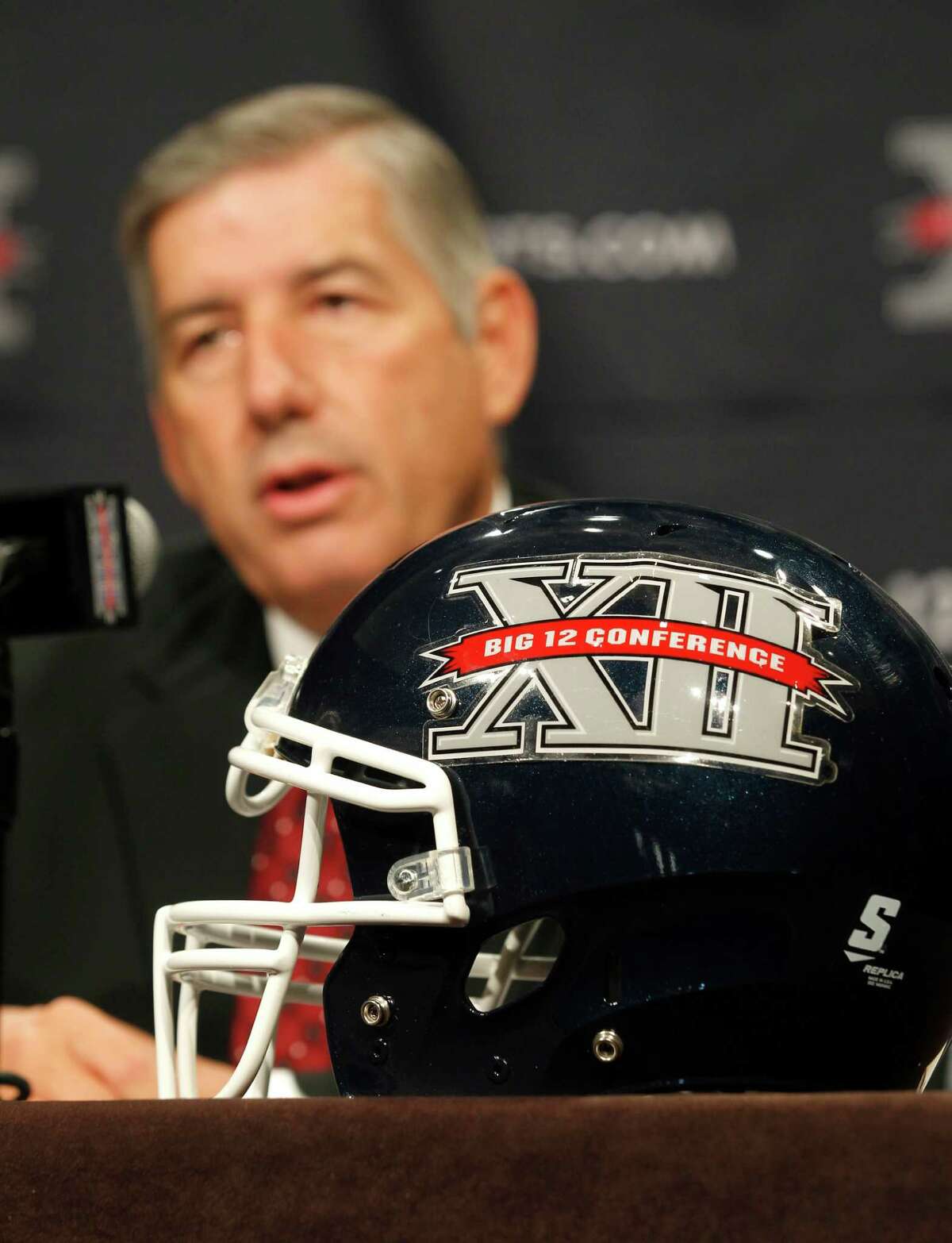 Big 12 Conference Commissioner Bob Bowlsby addresses the media at the beginning of the Big 12 Conference Football Media Days, Monday, July 22, 2013 in Dallas. (AP Photo/Tim Sharp)