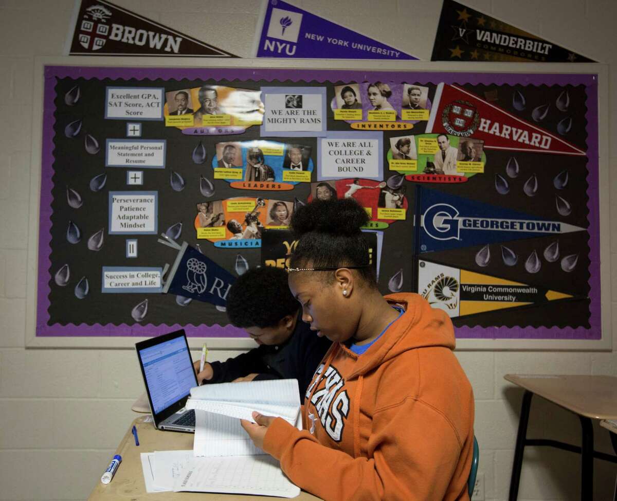 Kashmere High School's Kiana Sheffield, 17, and Zackary Hines, 17, study during their Advanced Placement physics class in March 2015. Teacher Adeeb Barqawi started the first AP physics class at the school.