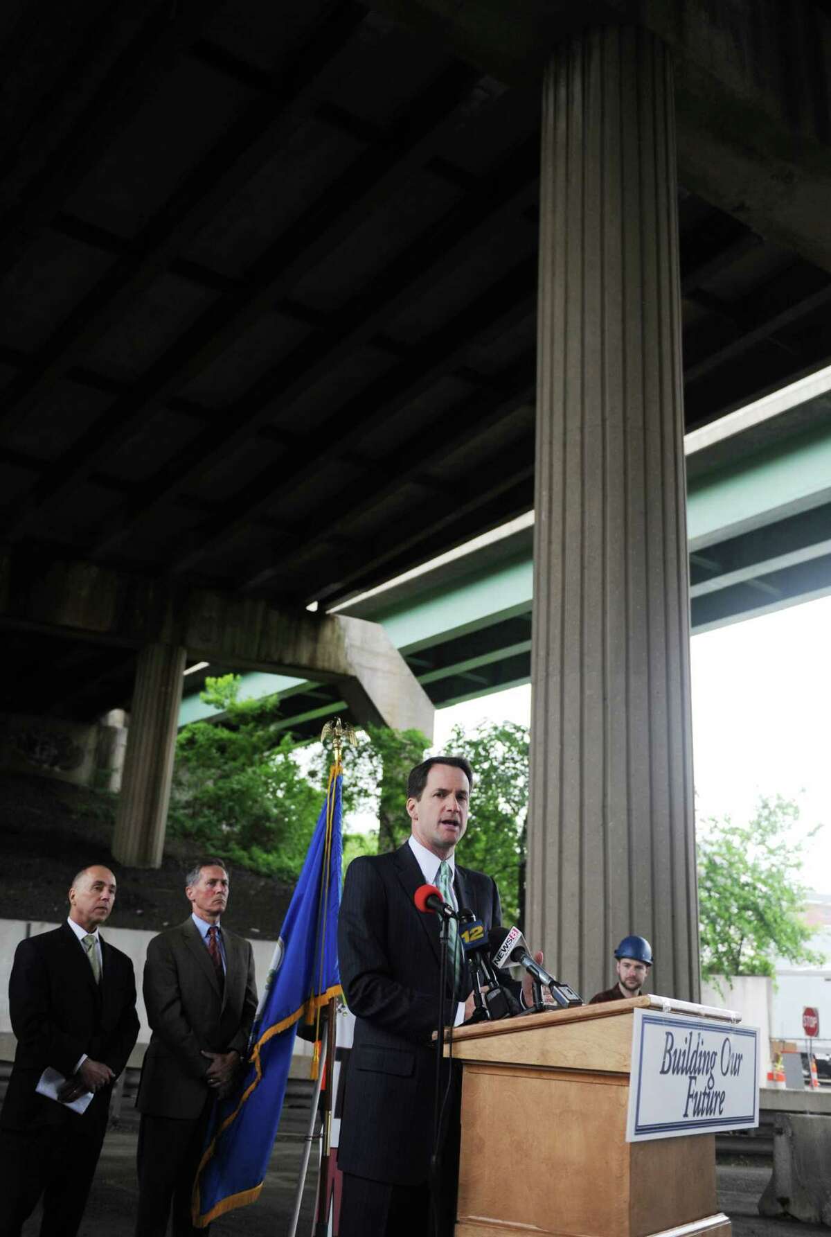 U.S. Rep. Jim Himes speaks at a bridge safety press conference beneath the I-95 bridge passing over the intersection of Lafayette Street and State Street in Stamford, Conn. Monday, June 1, 2015. U.S. Rep. Jim Himes, Stamford Mayor David R. Martin and Connecticut Construction Industries Association President Donald Shubert spoke on the need to repair structurally deficient bridges to maintain the current level of transportation and create jobs. A recent report found that there were 63 structurally deficient bridges in Fairfield County and this one in Stamford is particularly important as it passes over the Metro-North track and a collapse or falling debris could potentially cripple transportation throughout the region.
