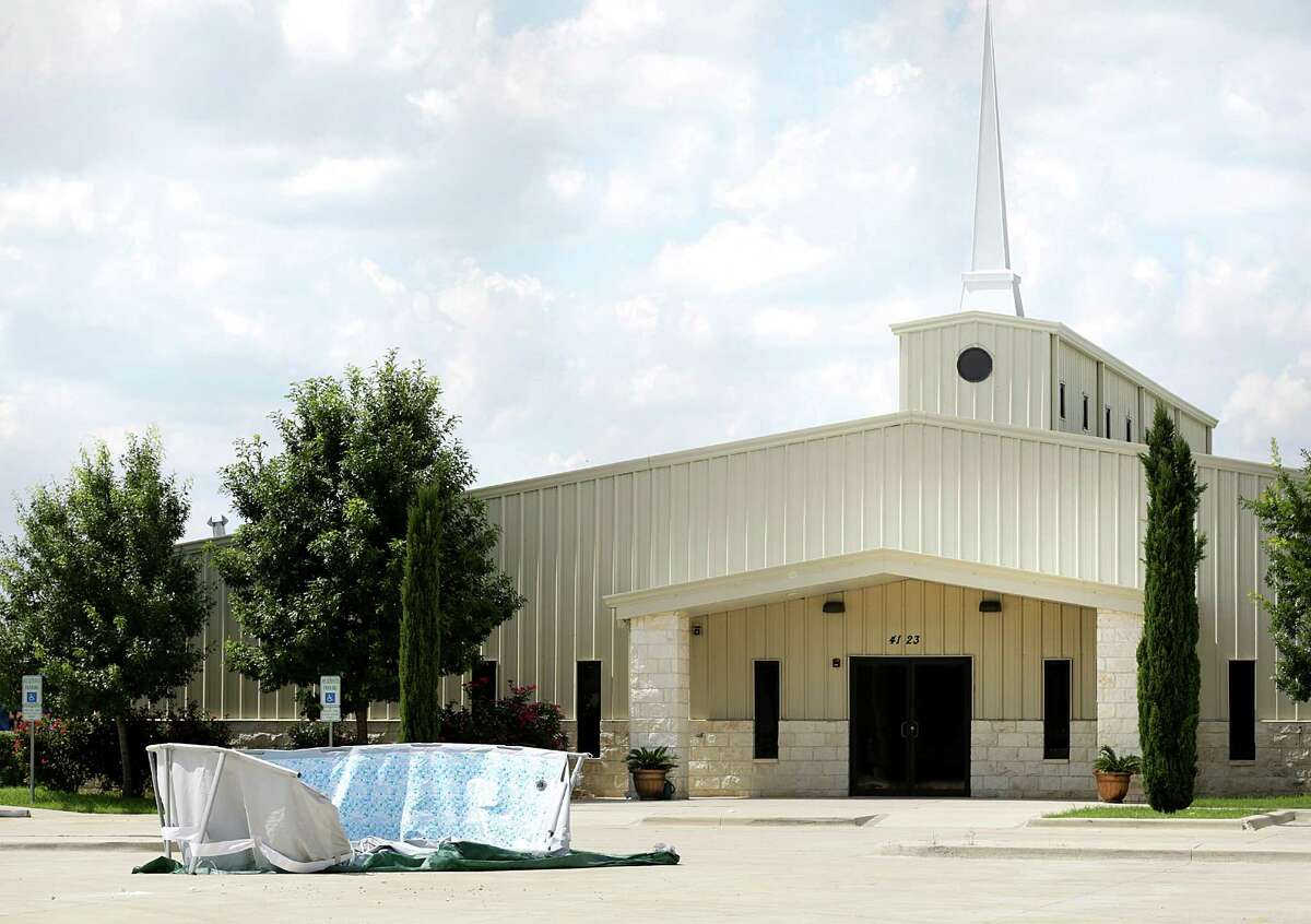 An above ground pool with a collapsed side is seen in the parking lot in front of Ephesus Seventh Day Adventist Church on Monday June 1, 2015, at 4123 E. Houston St. It is reported that the pool was filled by a City of San Antonio Fire truck, and was used for baptisms.