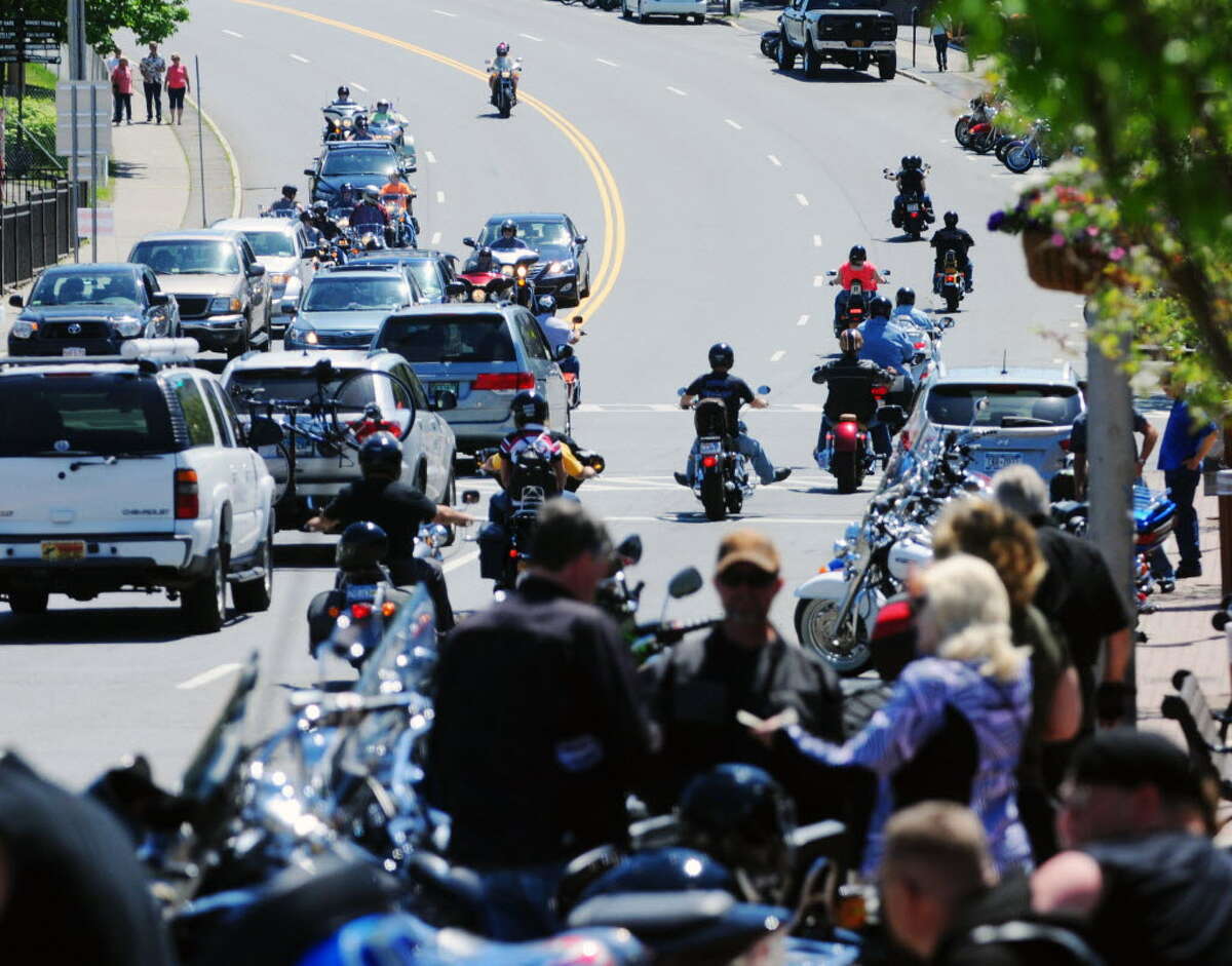 Americade riders make their way through Lake George on Monday, June 2, 2014, in Lake George, N.Y. Americade is the worldaTMs largest multi-brand motorcycle touring rally. 