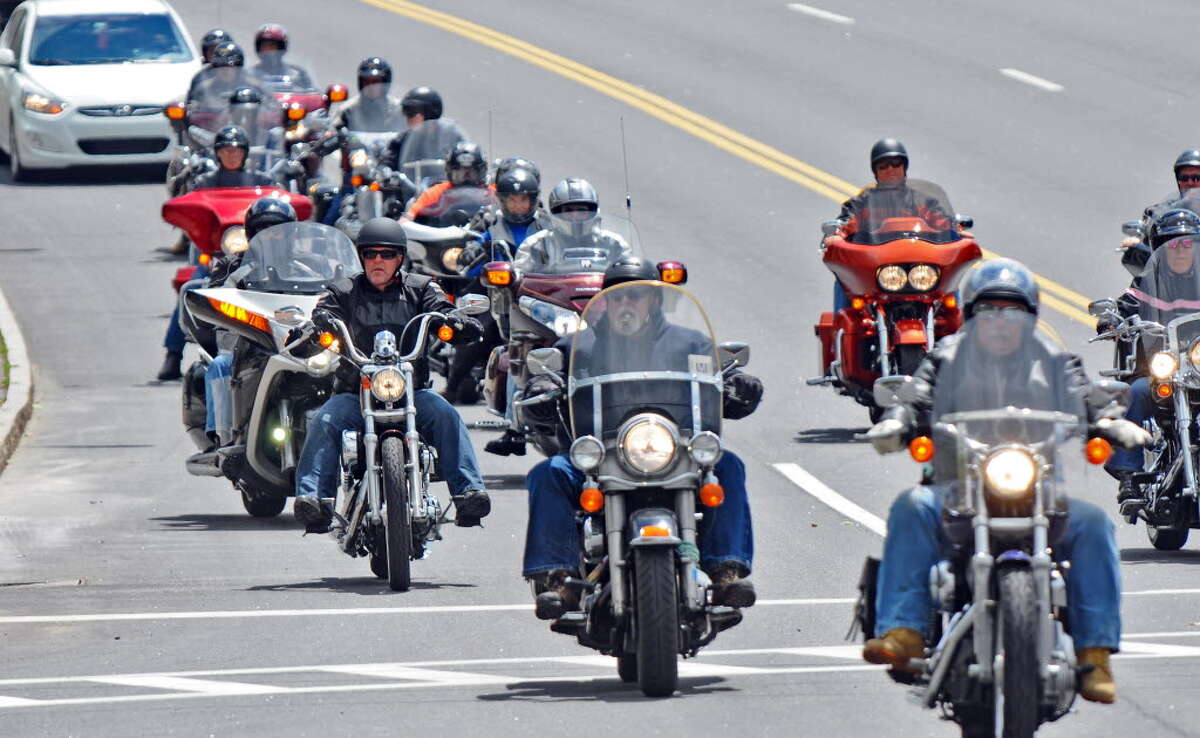 Bikers make their way along Canada Street as they arrive in the village for the annual Americade, on Tuesday June 5, 2012 in Lake George, NY. 