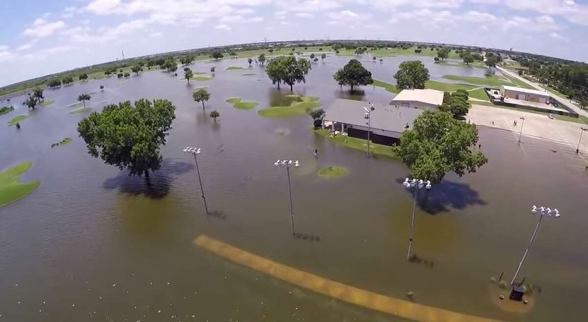 Drone video shows Texas golf course still a swamp a week after floods