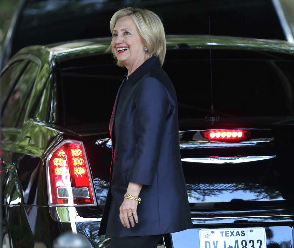 Presidential candidate and Democratic front-runner Hillary Clinton smiles as she arrives at Club Giraud, on Wednesday June 3, 2015, for a fundraising mission for her presidential bid.