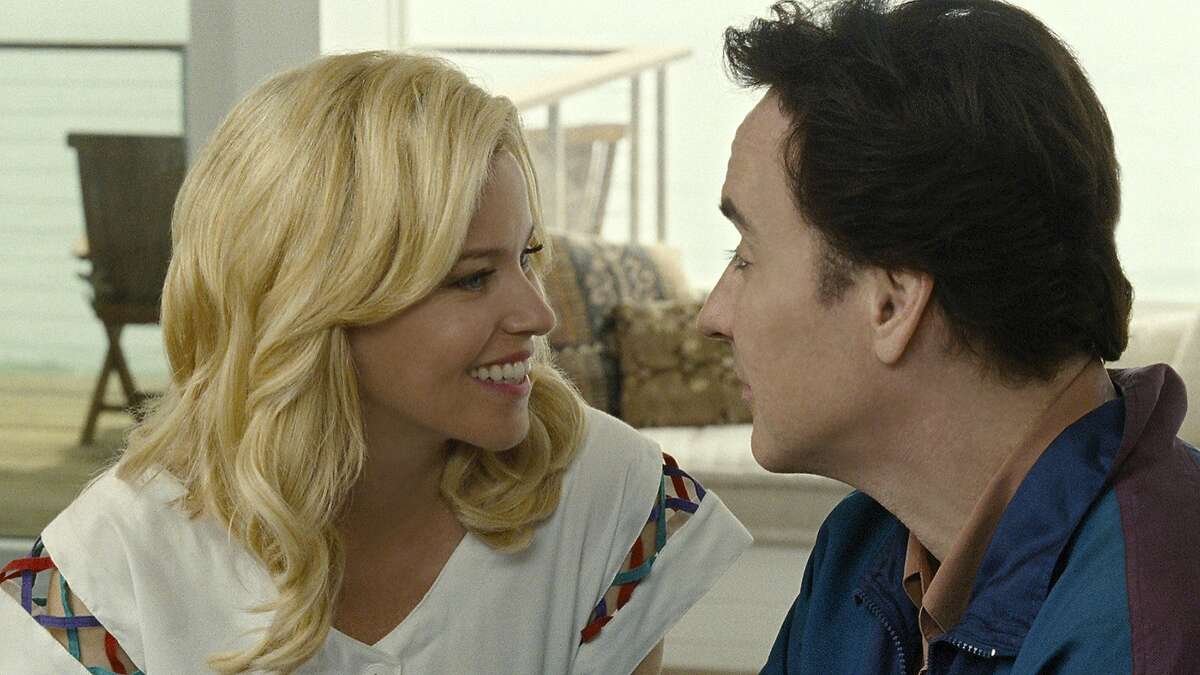 Elizabeth Banks and John Cusack are Melinda Ledbetter and Brian Wilson in “Love & Mercy.” Illustrates FILM-LOVE-ADV05 (category e), by Ann Hornaday © 2015, The Washington Post. Moved Wednesday, June 3, 2015. (MUST CREDIT: Francois Duhamel/Roadside Attractions.)