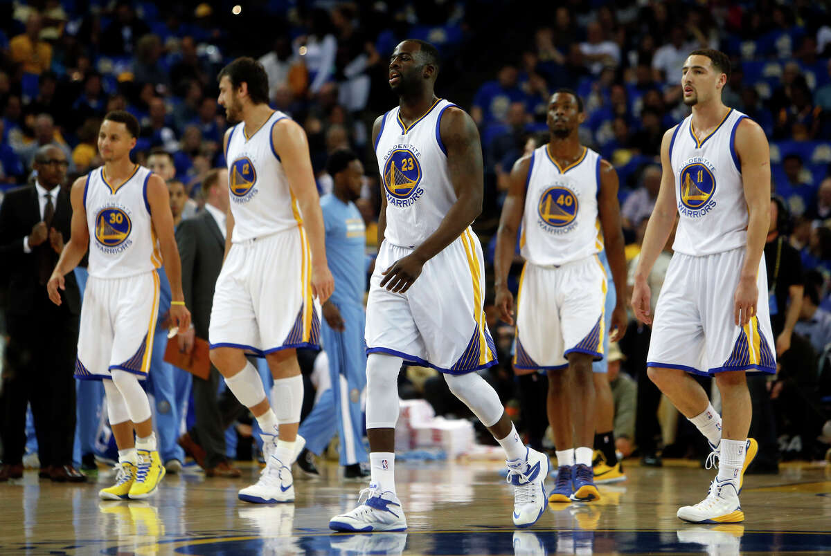 Stephen Curry (left), Andrew Bogut, Draymond Green, Harrison Barnes and Klay Thompson bought in to new coach Steve Kerr’s approach, and the result was the Warriors’ first trip to the NBA Finals in 40 years.
