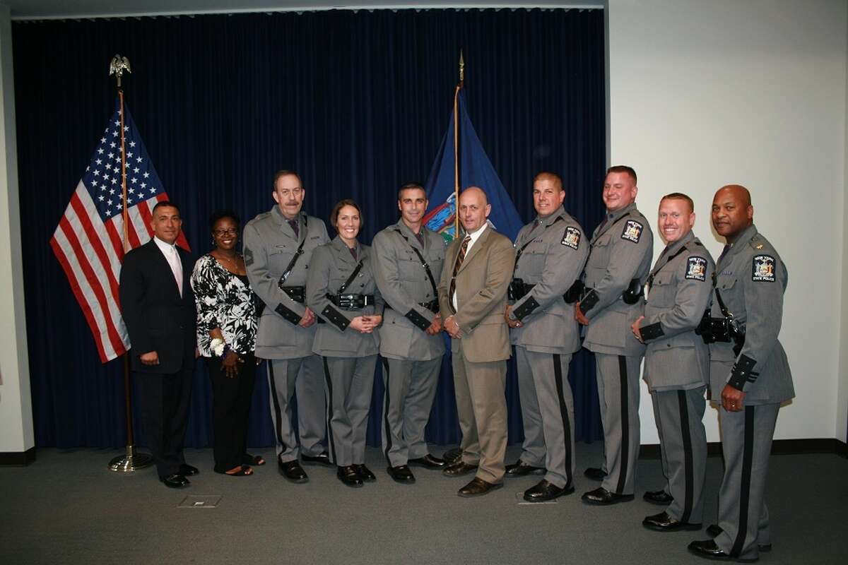Troop G award winners with Superintendent Joseph D'Amico on the left and Major Steven James on the right. (State Police photo)