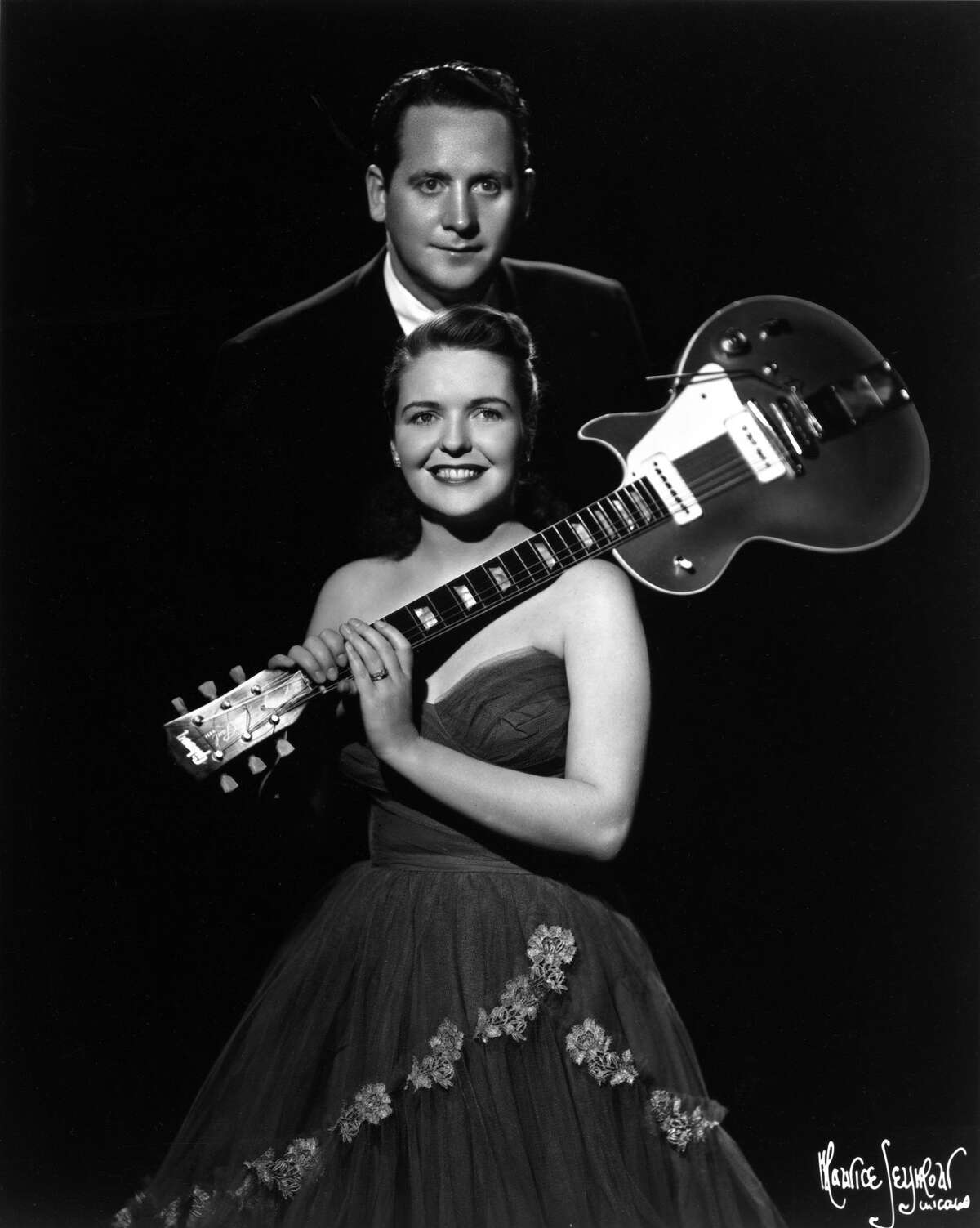 Les Paul, who performed with his wife, Mary Ford, created one of the first commercially successful solid-body electric guitars, the Gibson Les Paul in 1952. While Paul pitched the guitar to Gibson as early as 1940, there was little interest from the company until the Fender Broadcaster (later renamed the Telecaster) made its debut. The result was beyond anyone's wildest expectations — since the launch of Les Paul's guitar line 63 years ago, it has become an legendary icon of rock and roll and has been a favorite of guitarists the world over. Paul died in 2009. Click through the images in this slideshow to see just a few of the famous guitarists who have played Gibson Les Pauls over the years.