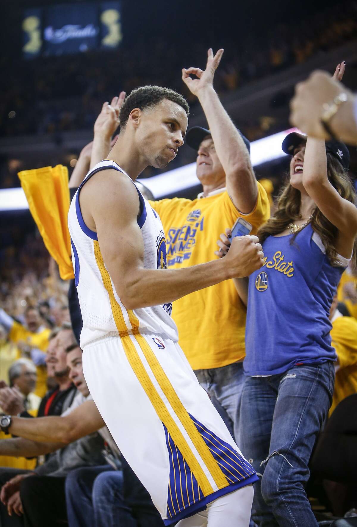 Golden State Warriors' Stephen Curry reacts in the second period during Game 1 of The NBA Finals on Thursday, June 4, 2015 in Oakland, Calif.