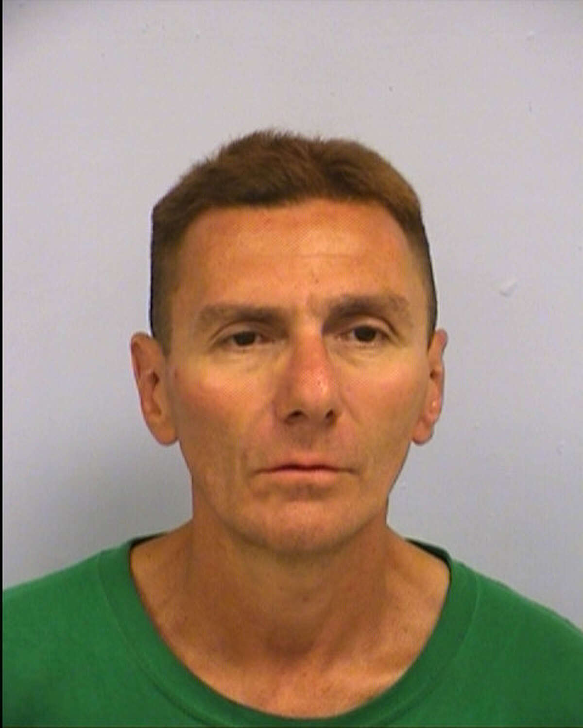 Edward Bennett, 49, was arrested for attempted capital murder for allegedly slashing a woman's throat during a robbery outside an H-E-B in Austin.