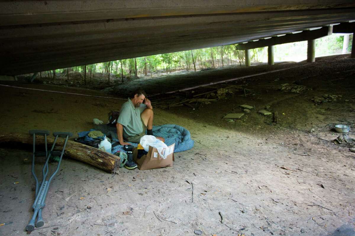 Paul Carbonneau, 60, was able to escaped from a food by keeping himself up an embankment until it became clear that he would have to abandon the under bridge he has called home for the past 15 years to survive the flood. Thursday, June 4, 2015, in Houston. ( Marie D. De Jesus / Houston Chronicle )