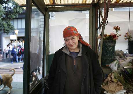 Margaret Karssli watches city life from Paul's Flower Stand on Powell Street in San Francisco, Calif.