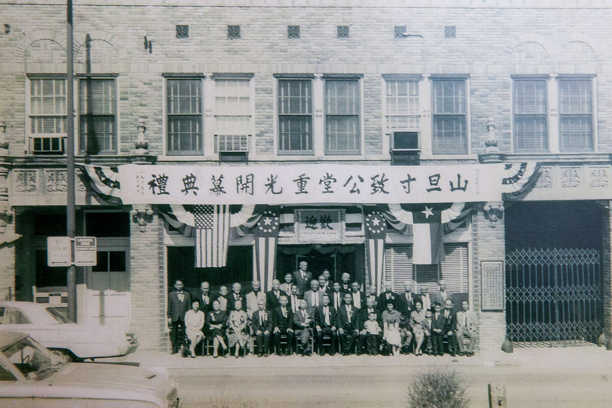 Chinese community members, known as the Chinese Free Mason, congregate on Houston Street in 1960s San Antonio. A reader praises our series of historical stories, including a recent one on the local Chinese population here.