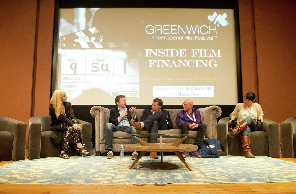 A panel speaks about film financing as part of the Greenwich International Film Festival at the Cole Auditorium at the Greenwich Library in Greenwich, Conn., on Saturday, June 6, 2015. From left are Kristen Konvitz of Indiegogo, Milan Popelka of FilmNation, Clay Pecorin, Jeff Lipsky, and Mynette Louie of Gamechanger Films.