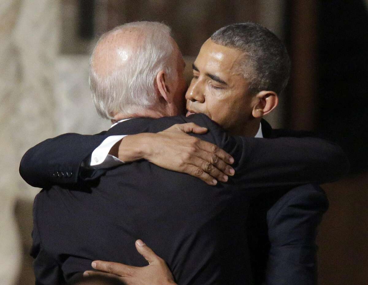 Vice President Joe Biden shares a hug with President Barack Obama after Obama eulogized Biden's son, Beau Biden, during his funeral at St. Anthony of Padua R.C. Church in Wilmington, Saturday, June 6, 2015. Over 1,000 mourners were in attendance at St. Anthony of Padua Roman Catholic Church, including Attorney General Loretta Lynch; Sens. Mitch McConnell, R-Ky., and Harry Reid, D-Nev., the majority and minority leaders; and other administration officials and political figures. (William Bretzger/The Wilmington News-Journal via AP, Pool)