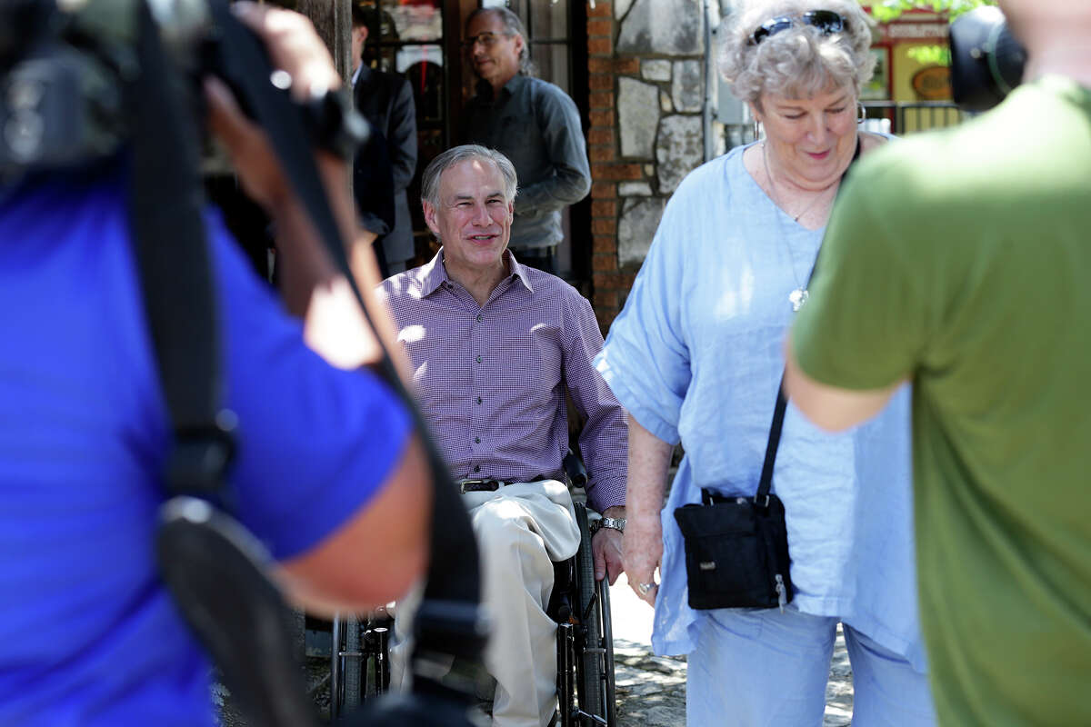 Texas Governor Greg Abbott visits business establishments in downtown Wimberley on June 6,, 2015.