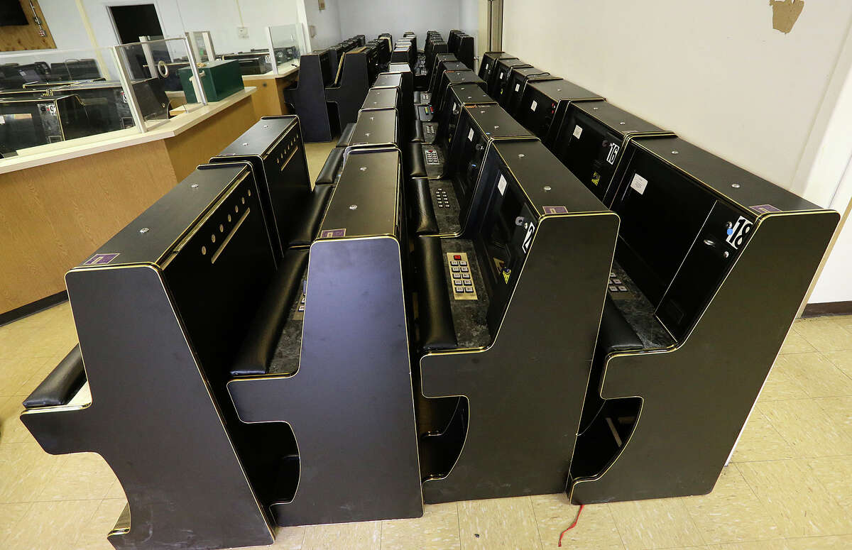 Eight liners gambling machines are stored in an unused office building in McAllen, Texas, Thursday, June 3, 2015. Hidalgo and Cameron counties have put pressure by raiding gambling establishments forcing most of them to go underground. Last year, Starr county officials embraced this burgeoning industry when it passed a $500 licensing fee per slot machine, touting the $1.7 million it would generate for the county.