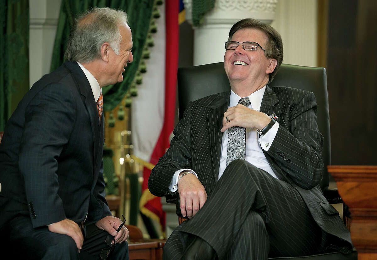 Sen. Kirk Watson, left, shares a lighter moment with Lt. Governor Dan Patrick, right, during a brief pause as they wait on amendments to be printed, Wednesday, May 27, 2015 in Austin, Texas. (Ralph Barrera/Austin American-Statesman via AP) AUSTIN CHRONICLE OUT, COMMUNITY IMPACT OUT, INTERNET AND TV MUST CREDIT PHOTOGRAPHER AND STATESMAN.COM, MAGS OUT