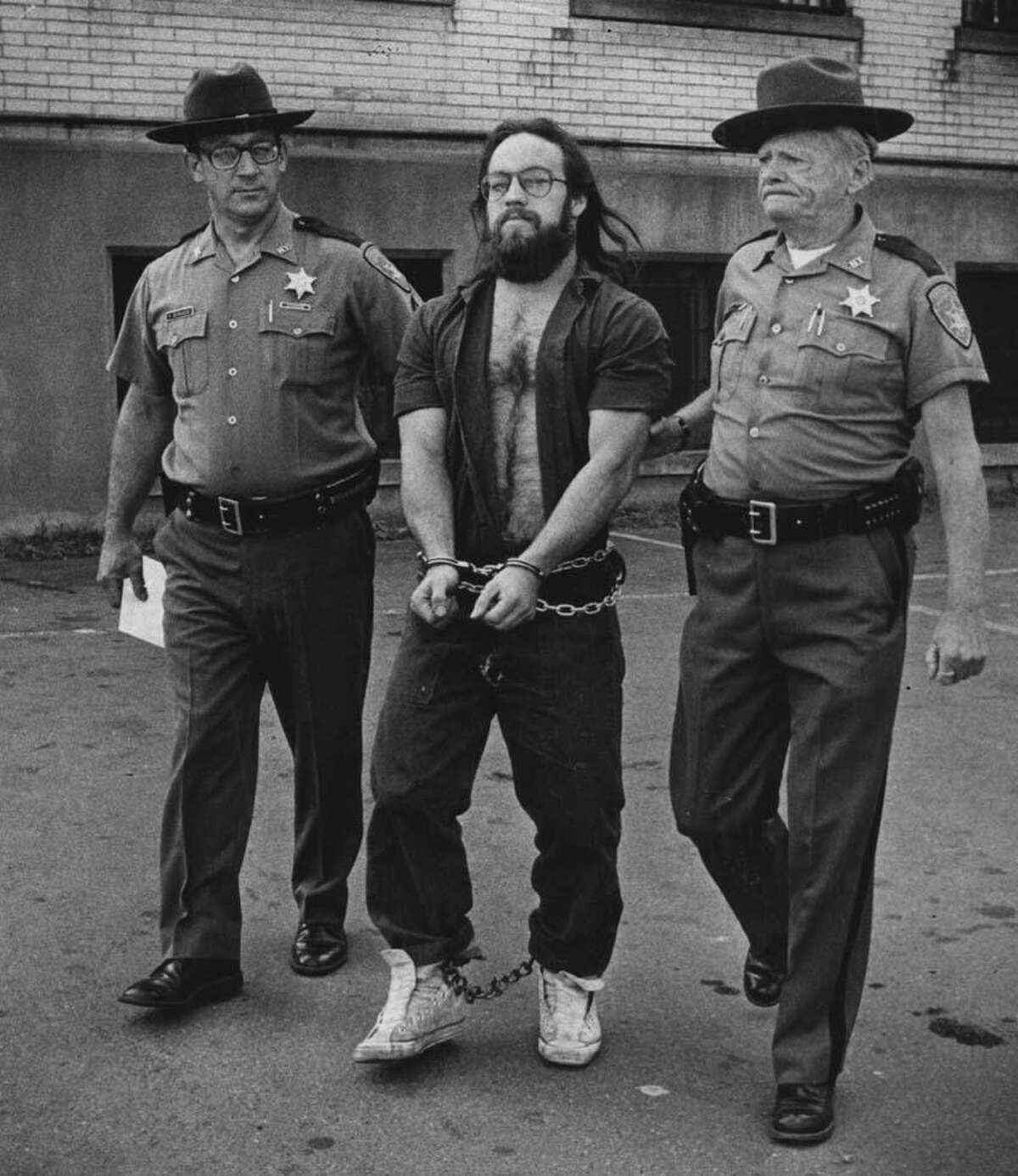 Police capture Gary Evans following his 1980 escape from the Rensselaer County Jail. (Times Union archive)