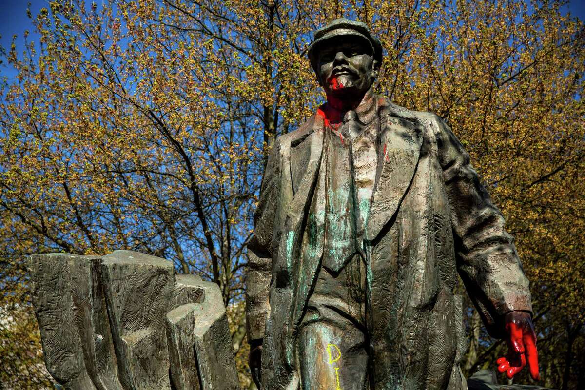 Spattered in red "blood" paint, Fremont's provocative bronze statue of Russian communist revolutionary Vladimir Lenin, photographed Sunday, April 19, 2015, in Seattle, Washington. The piece was salvaged from Czechoslovakia in 1993 by an Issaquah resident living in the Central European country.