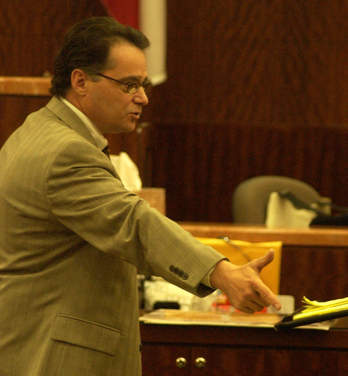 Cop KillingTrial: Harris County Prosecutor Dan Rizzo shows how defendant shot police officer in his closing arguments in the capital murder trial of Alfred Dewayne Brown, the man accused of killing Houston police officer Charles Clark during the robbery of a southeast side check-cashing store in 2003. Photo by Carlos Antonio Rios Houston Chronicle