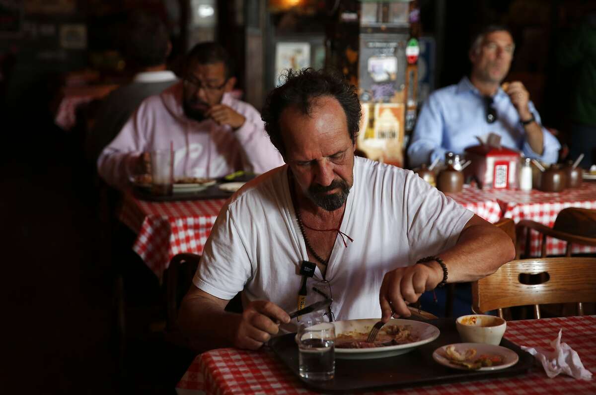 Michael Labunsky finishes up his lunch at Tommy's Joynt June 9, 2015 in San Francisco, Calif.