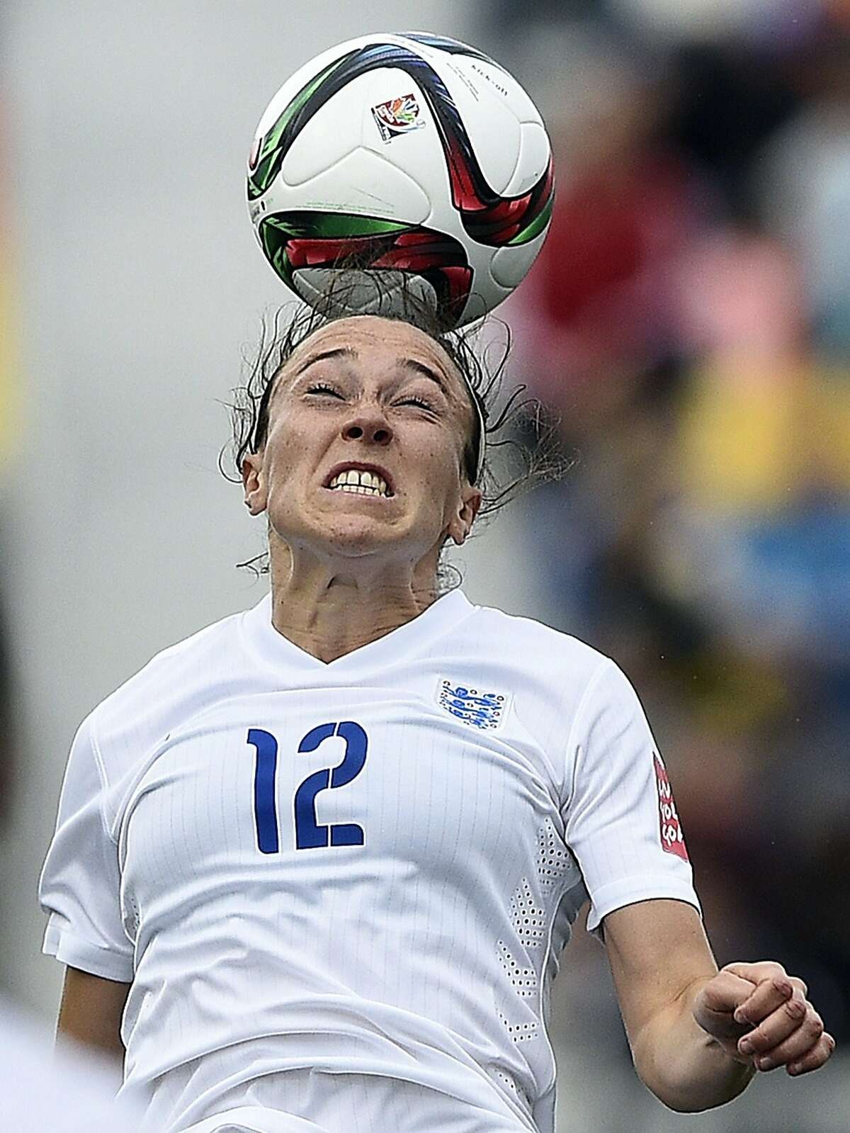 England's defender Lucy Bronze jumps for the ball during a Group F match at the 2015 FIFA Women's World Cup between France and England at Moncton Stadium on June 9, 2015 AFP PHOTO / FRANCK FIFEFRANCK FIFE/AFP/Getty Images