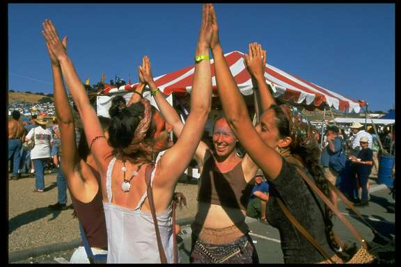 Unident. female fans circle dancing at concert of rock band Ratdog, which was formed by former Grateful Dead guitarist Bob Weir after Jerry Garcia's death.  (Photo by John Storey/The LIFE Images Collection/Getty Images)