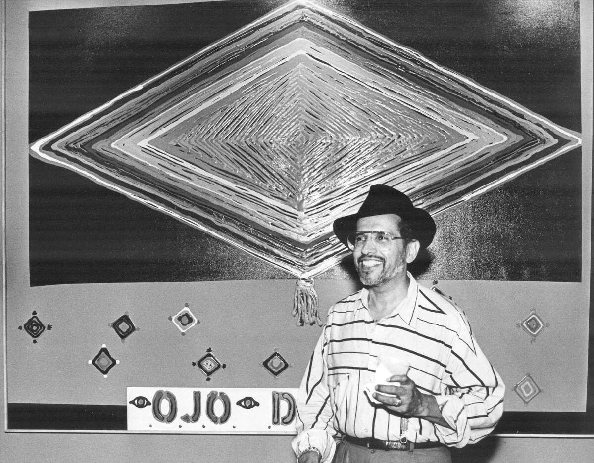 Artist Mel Casas is shown at an opening reception for his works on July 22, 1988. OTS photo taken by Al Caballero/Express-News file photo