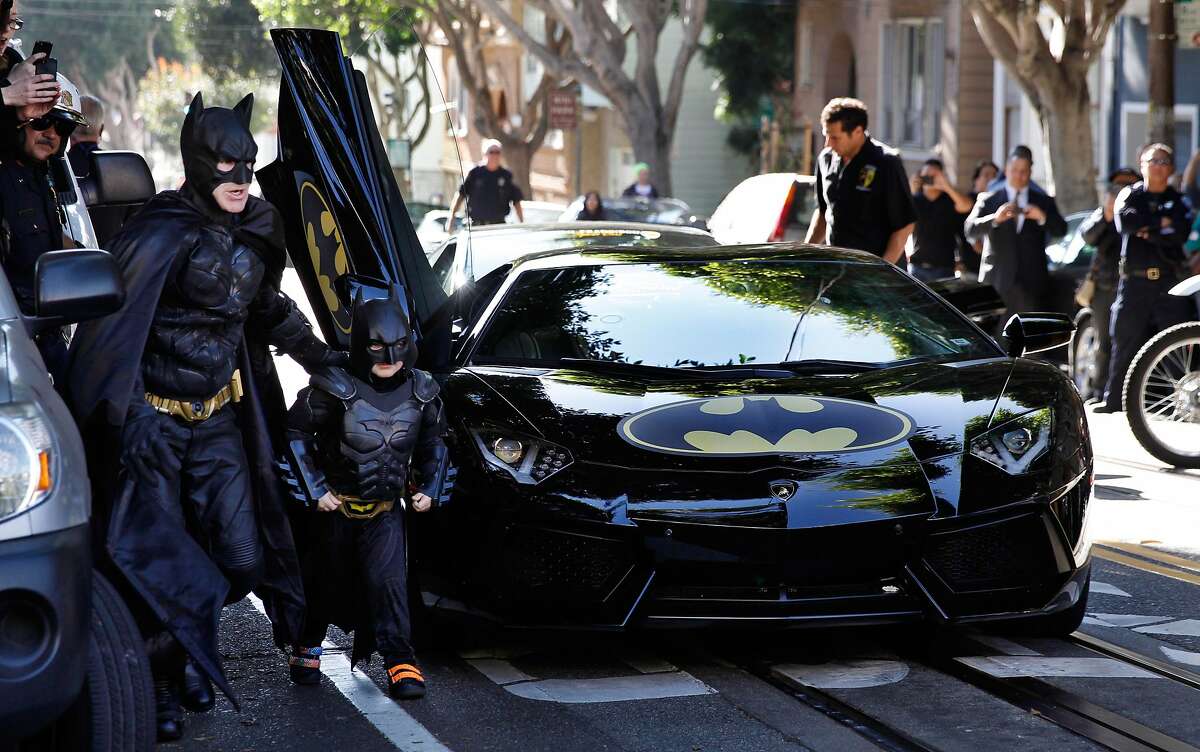 E.L. Johnson as Batman and Miles Scott as Batkid in the documentary "Batkid Begins." Five-years-old Miles, from Tule Lake, Calif., is dressed in a Batman costume in San Francisco, Friday, November 14, 2014. Miles, who wants to be a Batman, will embark on a series of crime-solving adventures when San Francisco is converted into â€?“Gotham Cityâ€ as part of a Make-A-Wish Foundation event. He is in a fight on his own in his battle against leukemia since he was a year old. He is now in remission. (Photo: Make-A-Wish Foundation/PaulSakuma.com)