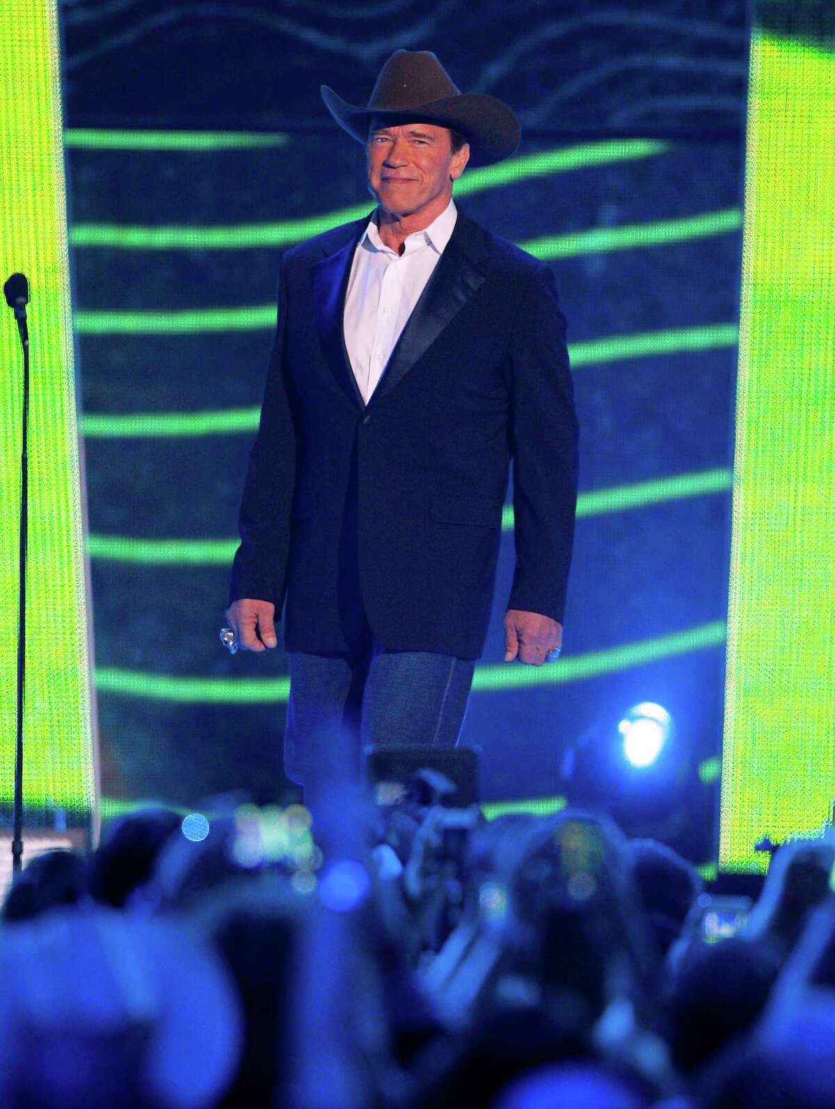 Arnold Schwarzenegger appears onstage at the CMT Music Awards at Bridgestone Arena on Wednesday, June 10, 2015, in Nashville, Tenn. (Photo by Wade Payne/Invision/AP) ORG XMIT: TNDC192