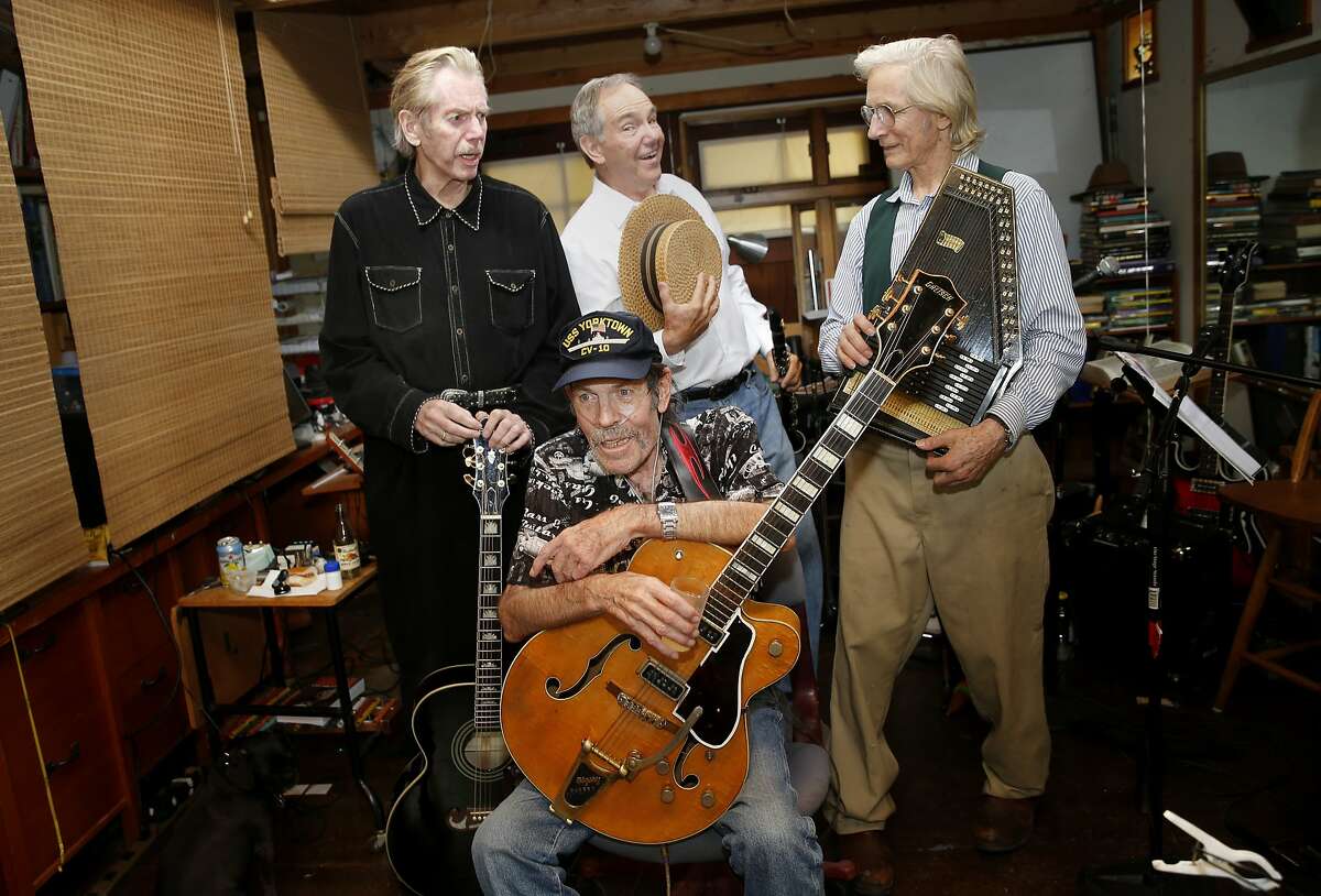 The Charlatans: Dan Hicks (left), Mike Wilhelm (seated), Richard Olson and George Hunter pose in their Sonoma, Calif. rehearsal space Wednesday June 10, 2015. The Charlatans, a hugely influential psychedelic band of the 1960s, is getting back together for some performances in Virginia City, Nevada.