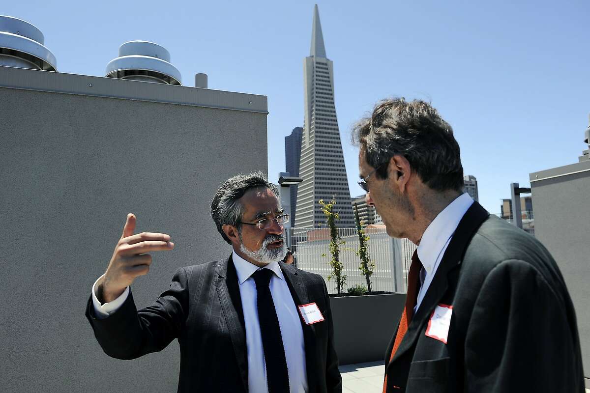 Former supervisor Aaron Peskin, left, tours the rooftop deck with architect Daniel Solomon during a grand opening celebration of new affordable family rental housing Broadway Sansome Apartments in San Francisco, CA Thursday, June 11, 2015.