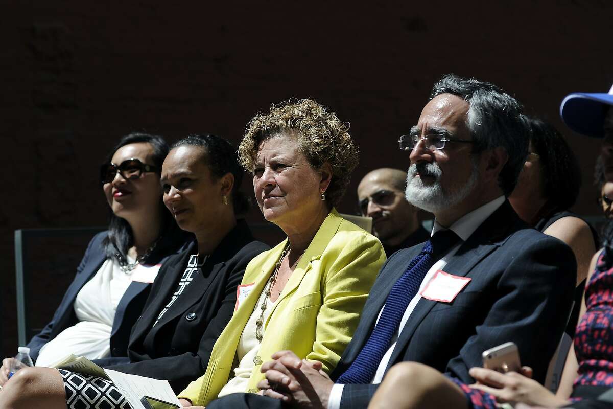 Supervisor Julie Christensen listens to speakers during the grand opening celebration of the new affordable family rental housing Broadway Sansome Apartments in San Francisco, CA Thursday, June 11, 2015.