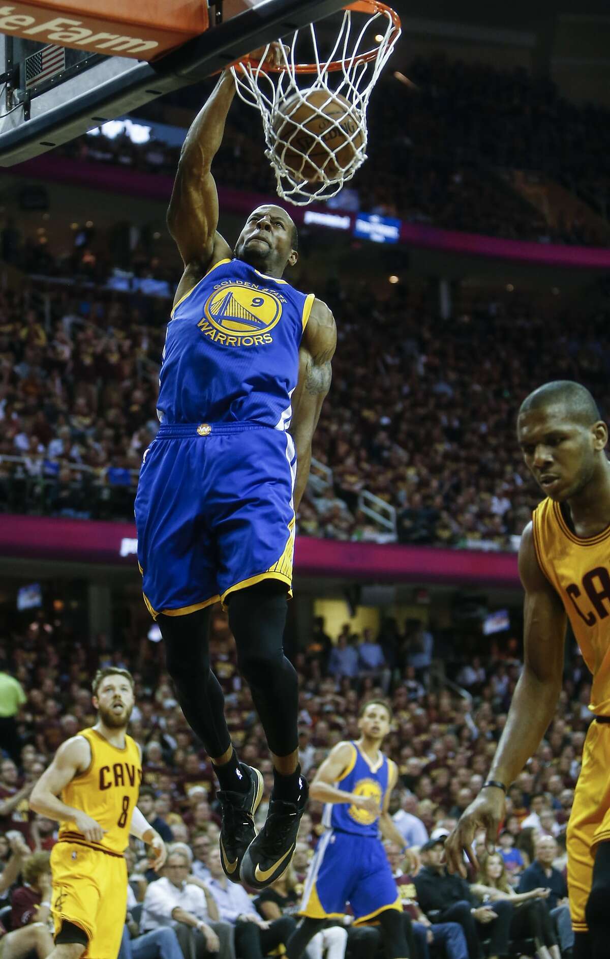 Golden State Warriors' Andre Iguodala dunks the ball in the first period during Game 4 of The NBA Finals between the Golden State Warriors and Cleveland Cavaliers at The Quicken Loans Arena on Thursday, June 11, 2015 in Cleveland, Ohio.