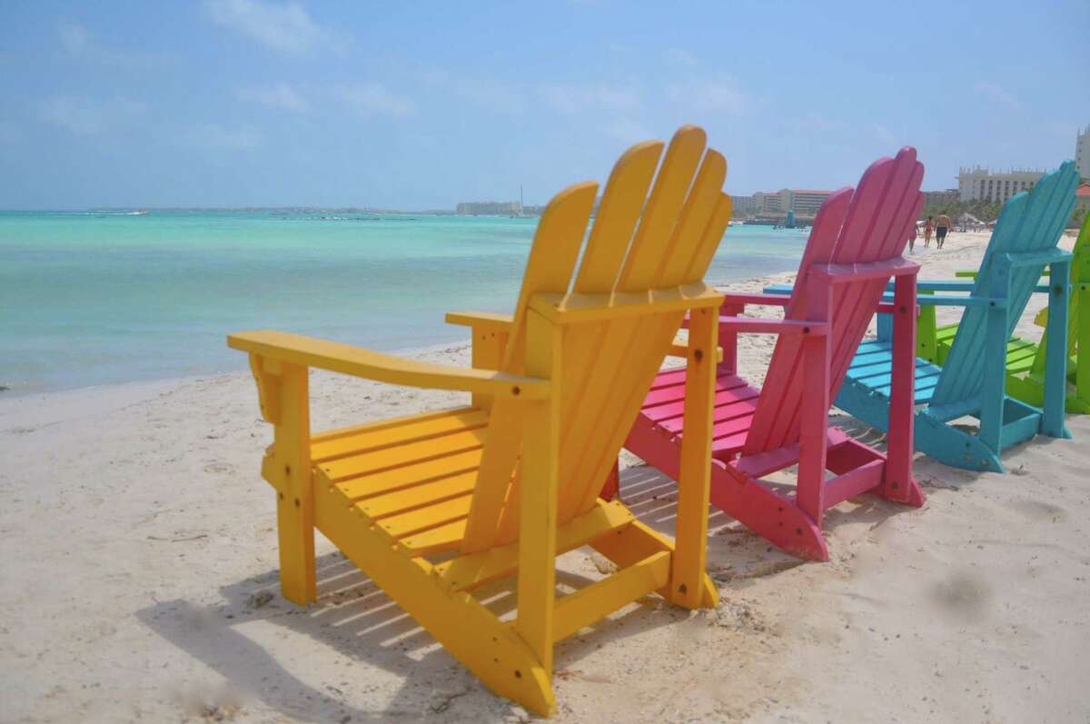 Explore the happy island of Aruba by boat, Jeep and horse